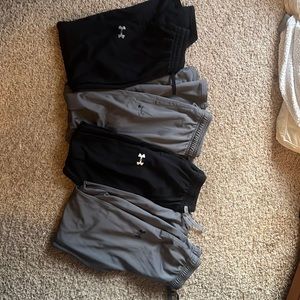 Lot of four pairs of UA pants